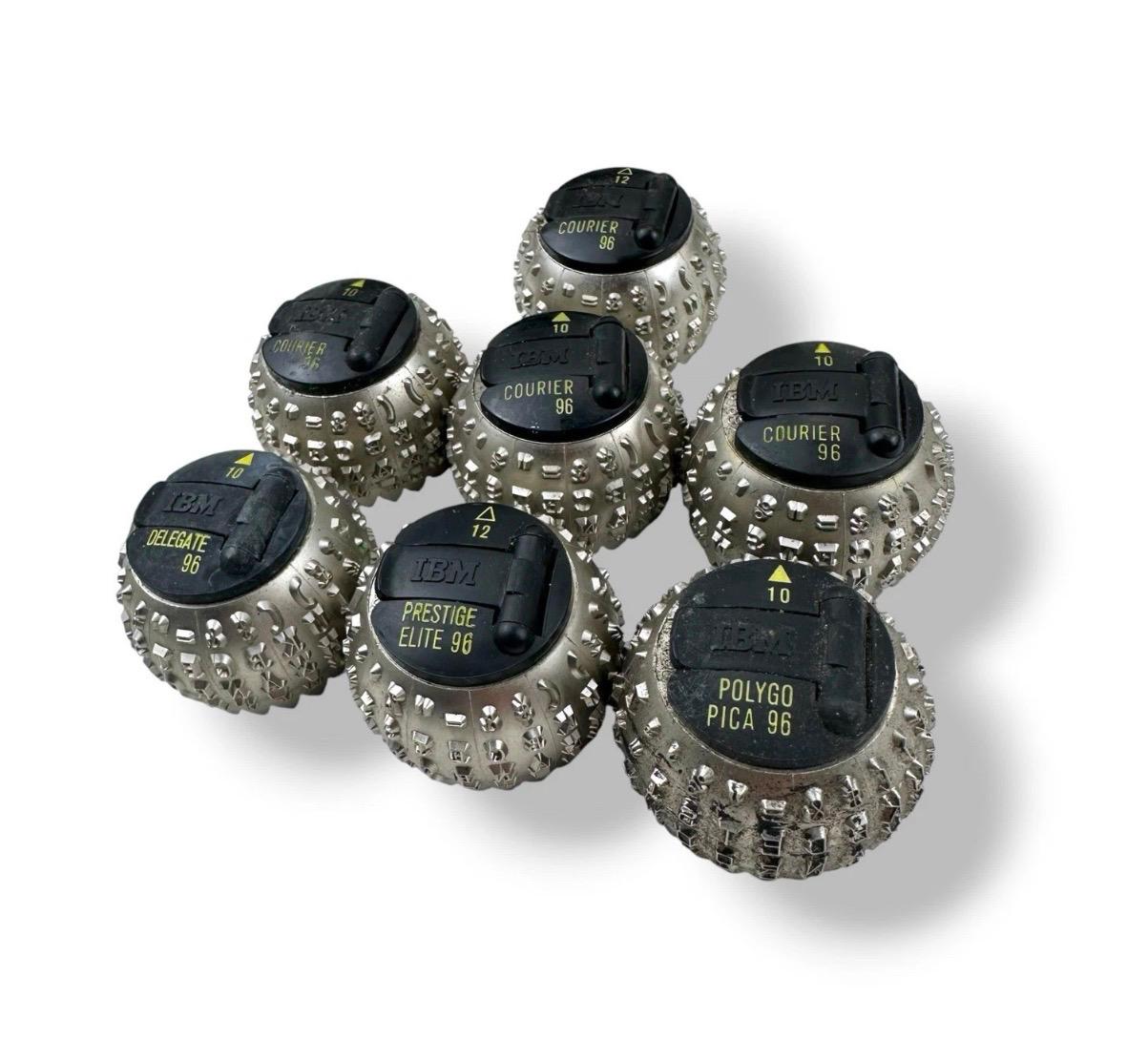 Click to open full-size image in a new tab IBM Selectric golf ball typing elements