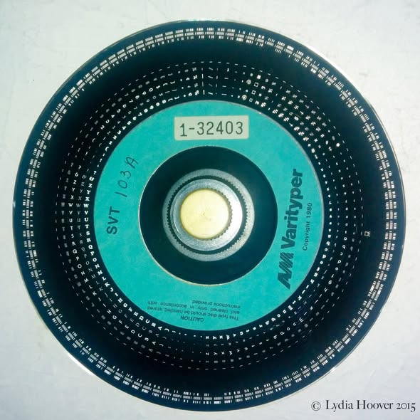 Click to open full-size image in a new tab AM Varityper typesetting disc